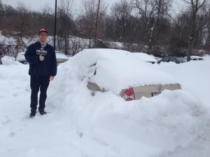 A Marist student (now a graduate) gets ready to shovel out his girlfriends car. Photo by Bob Tognetti