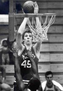A young Rik Smits going  up for a jump shot (courtesy of The Poughkeepsie Journal)