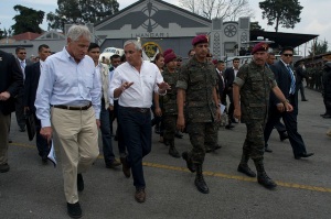 Former Guatemalan President Otto Perez Molina (center, white shirt) is currently being investigated for corruption charges. 